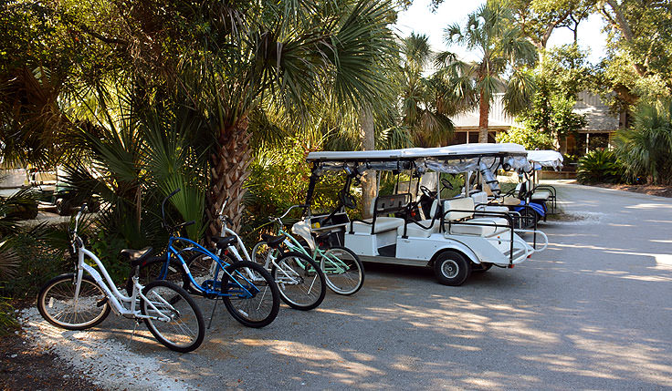 Golf cart and bike parking at Maritime Market on Bald Head Island, NC