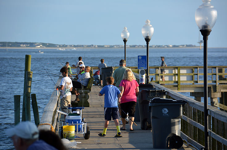 Fishing from city Pier at Waterfront Park in Southport, NC